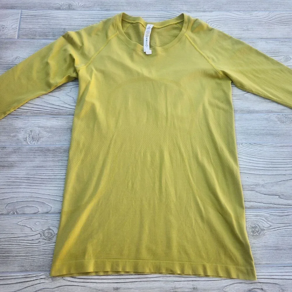 (8) Lululemon Swiftly Tech Long Sleeve Top